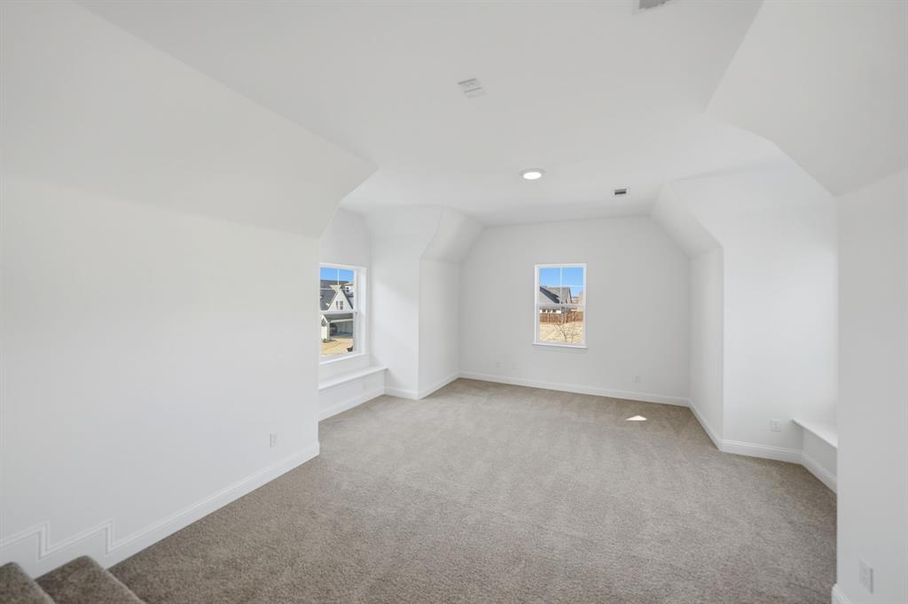 1227 Calebria Way Fate, TX 75087 - Photo 14 of 34 an empty room with a window