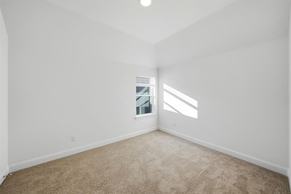 1227 Calebria Way Fate, TX 75087 - Photo 20 of 34 a view of empty room with windows