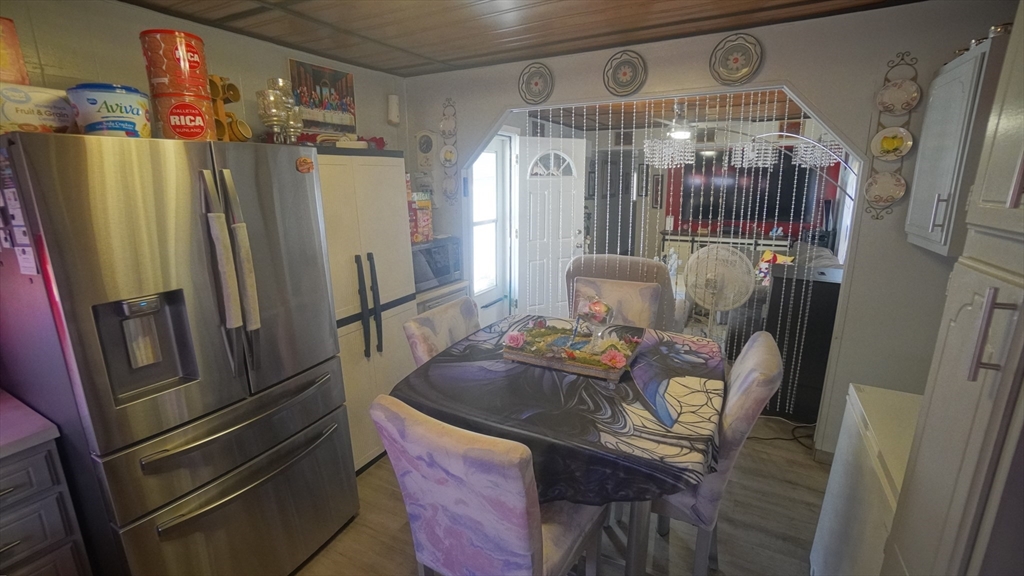 93 Grochmal Avenue, Unit 126 Springfield, MA 01151 - Photo 23 of 35 a kitchen with stainless steel appliances granite countertop a refrigerator and a stove