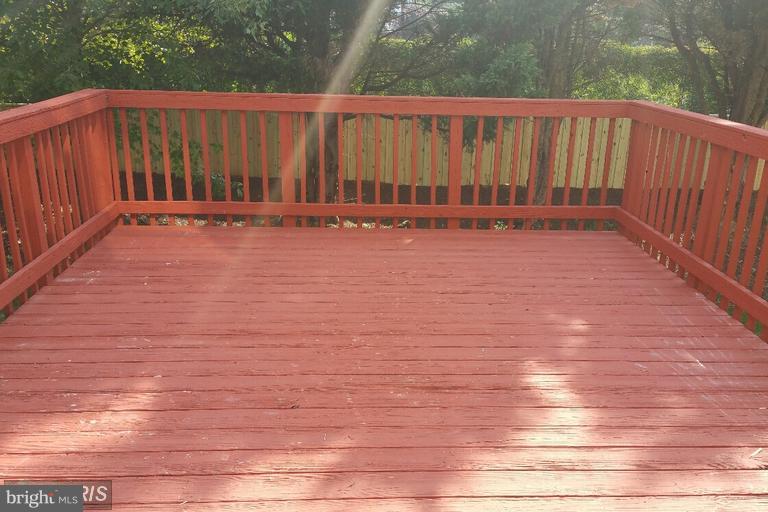 6367 Racetec Place Springfield, VA 22150 - Photo 14 of 25 a view of wooden fence