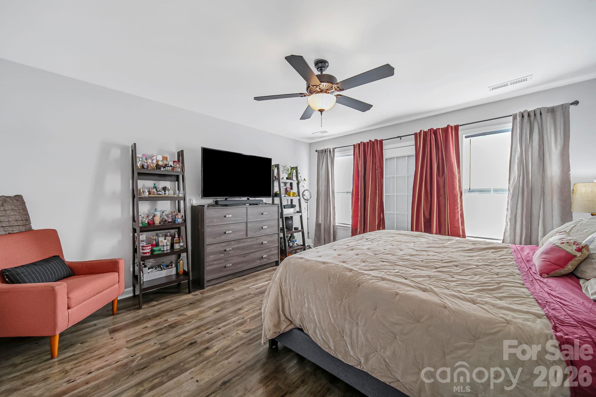 1189 West Elizabeth Street Pageland, SC 29728 - Photo 15 of 37 a bedroom with a bed and a flat screen tv