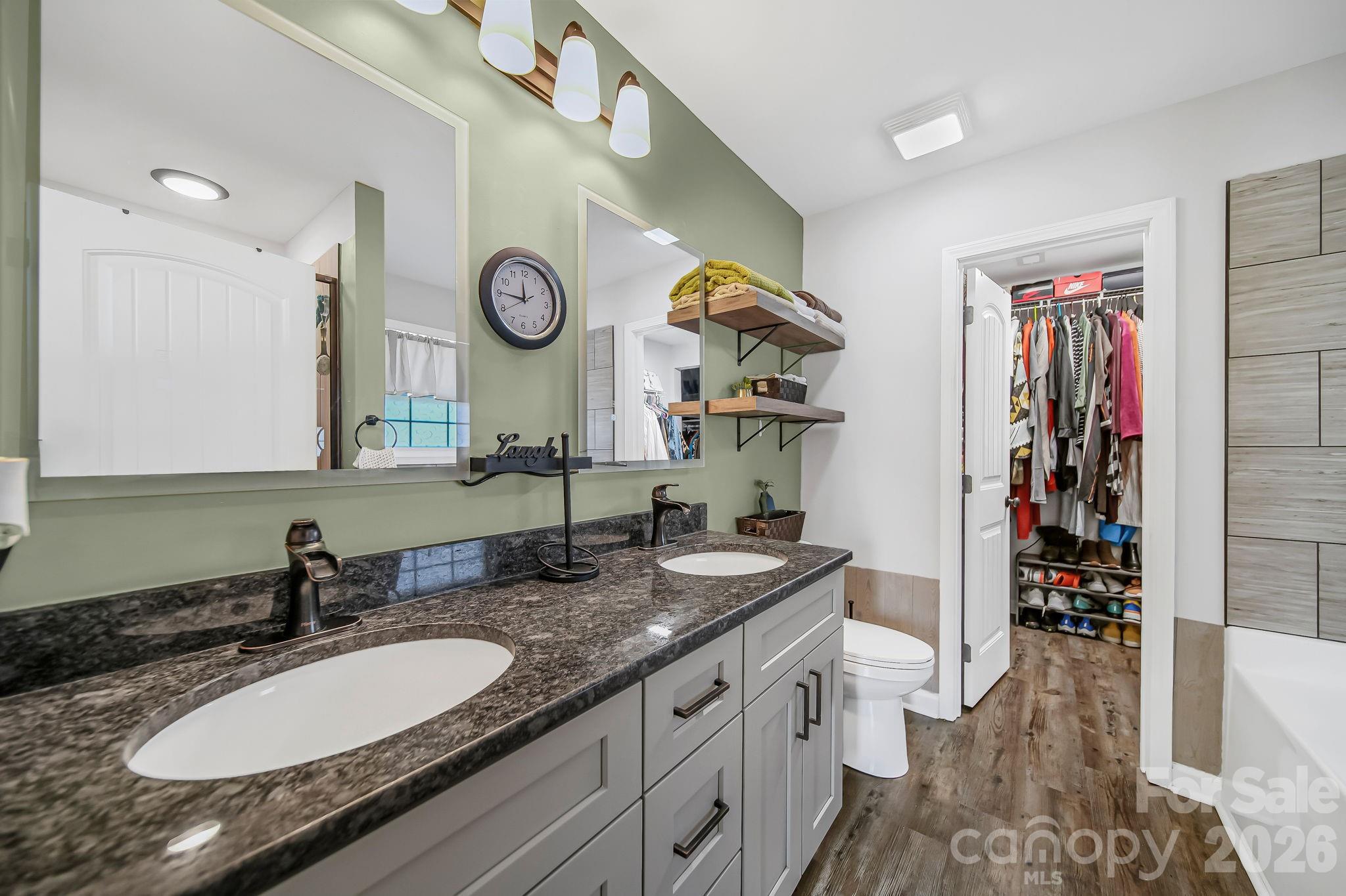 1189 West Elizabeth Street Pageland, SC 29728 - Photo 17 of 37 a bathroom with a sink double vanity and a mirror