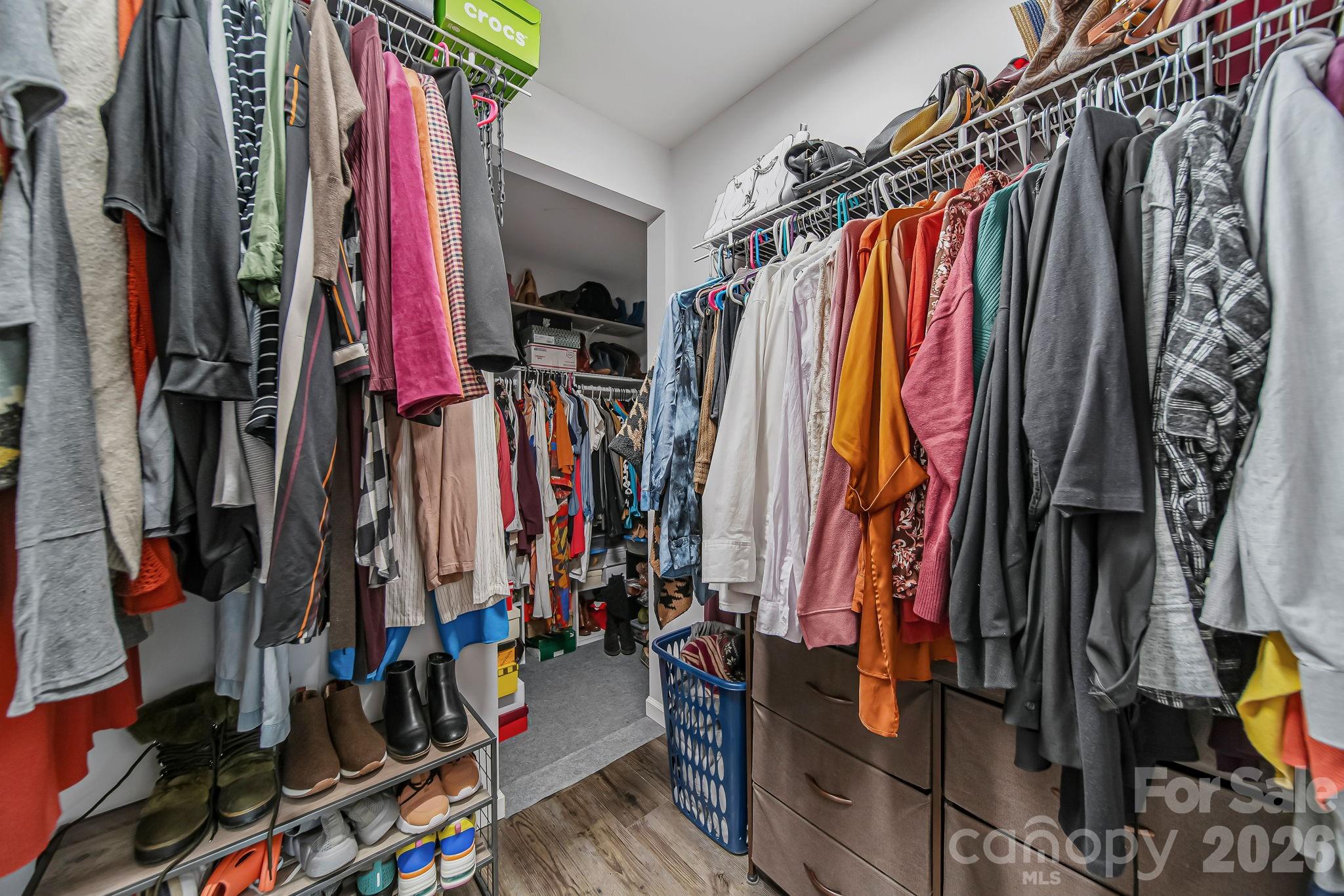 1189 West Elizabeth Street Pageland, SC 29728 - Photo 18 of 37 a view of walk in closet with clothes