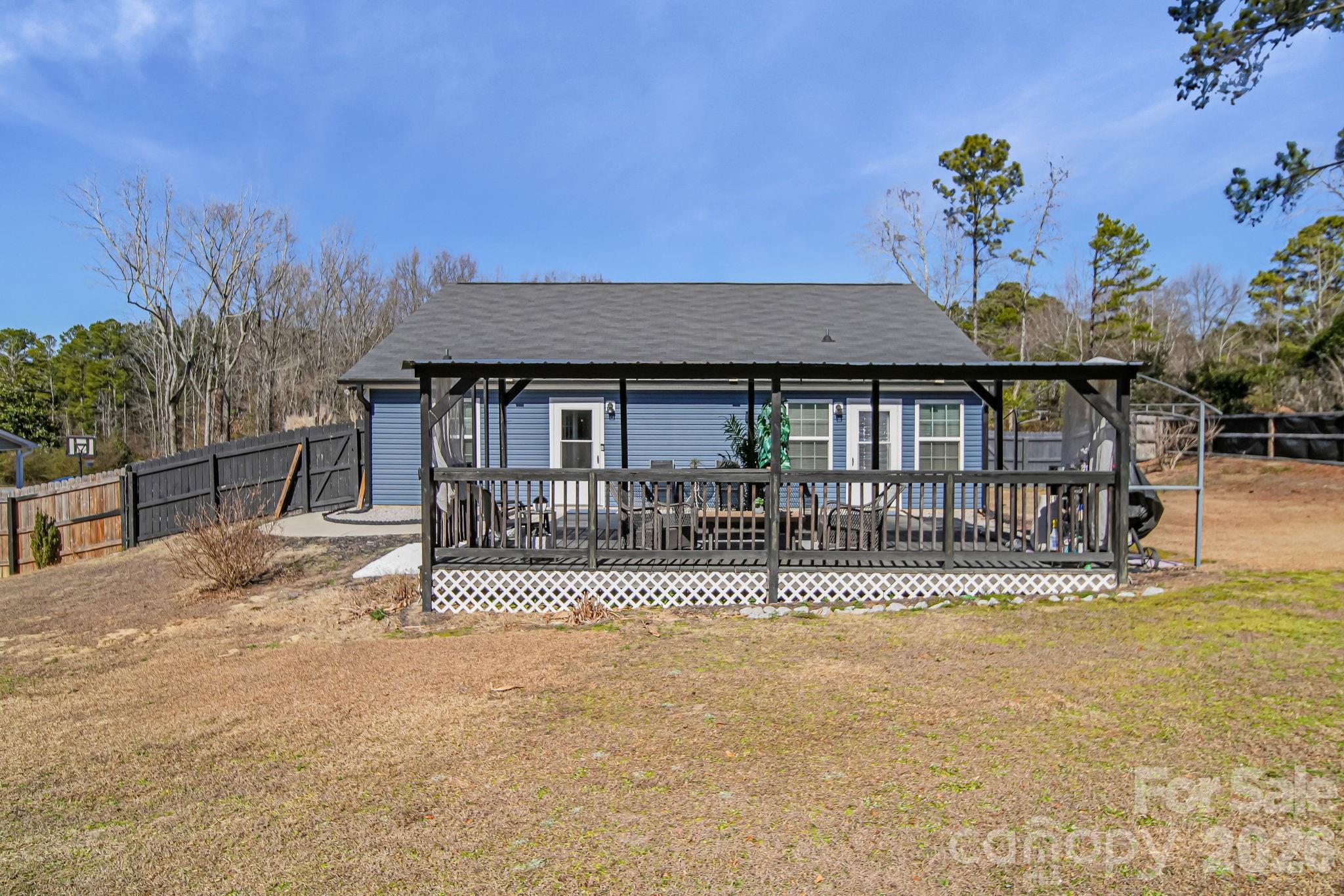 1189 West Elizabeth Street Pageland, SC 29728 - Photo 29 of 37 a front view of a house having a yard