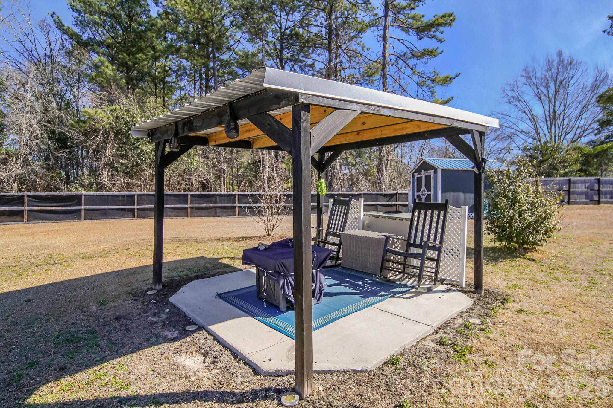 1189 West Elizabeth Street Pageland, SC 29728 - Photo 31 of 37 a view of outdoor space yard deck patio and swimming pool
