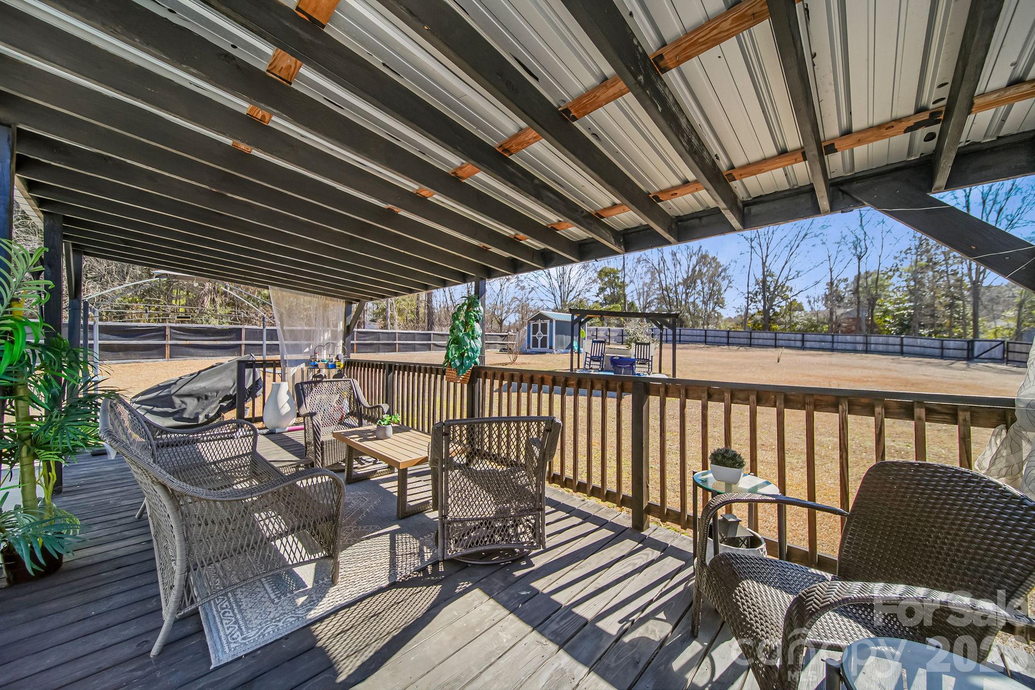 1189 West Elizabeth Street Pageland, SC 29728 - Photo 32 of 37 a view of a chairs and table in the balcony
