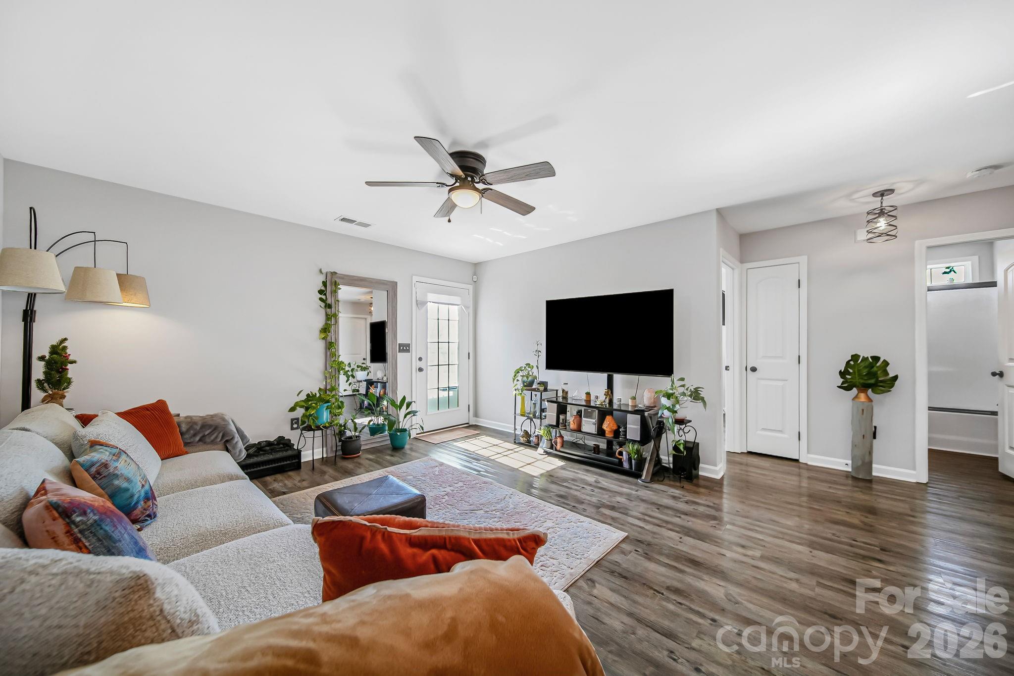 1189 West Elizabeth Street Pageland, SC 29728 - Photo 5 of 37 a living room with furniture and a flat screen tv