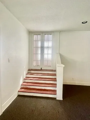 a view of a room with a wardrobe space