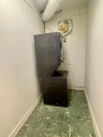a bathroom with a shower and a toilet