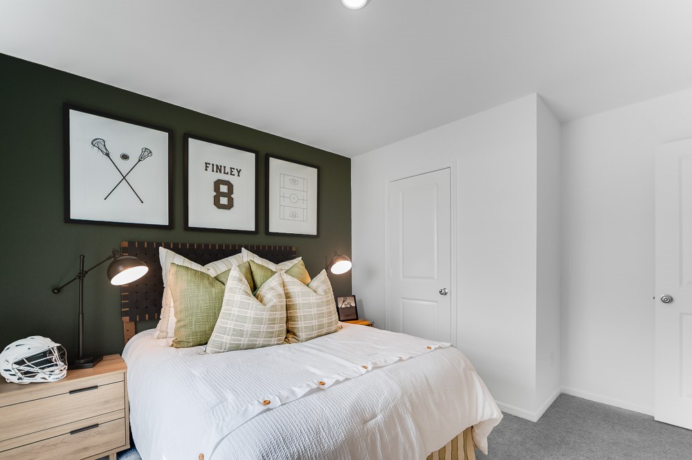 21930 Longhorn Rdg Drive Hockley, TX 77447 - Photo 21 of 39 a bedroom with a bed and painting on the wall