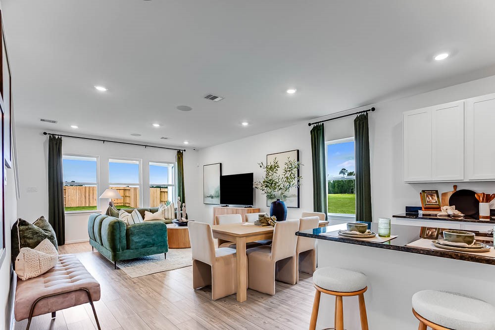 21930 Longhorn Rdg Drive Hockley, TX 77447 - Photo 5 of 39 a living room with furniture flat screen tv and outdoor view