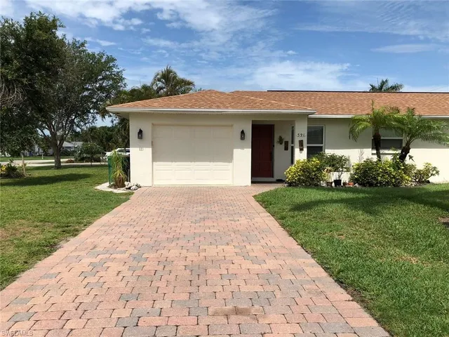 $925,000 | 595 101st Avenue North, Naples, FL 34108