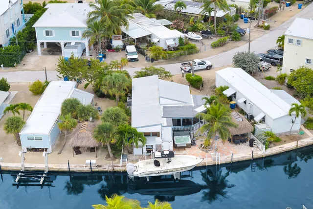 a view of a swimming pool with outdoor seating space