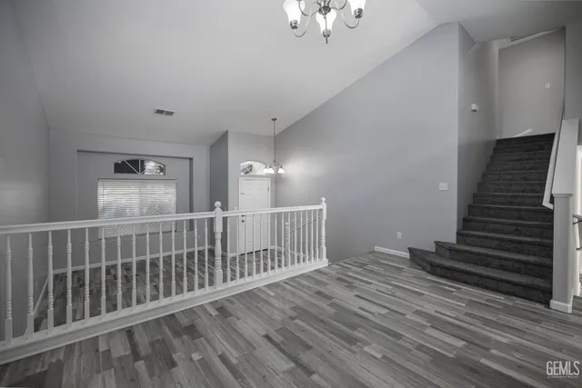 a view of entryway with wooden floor