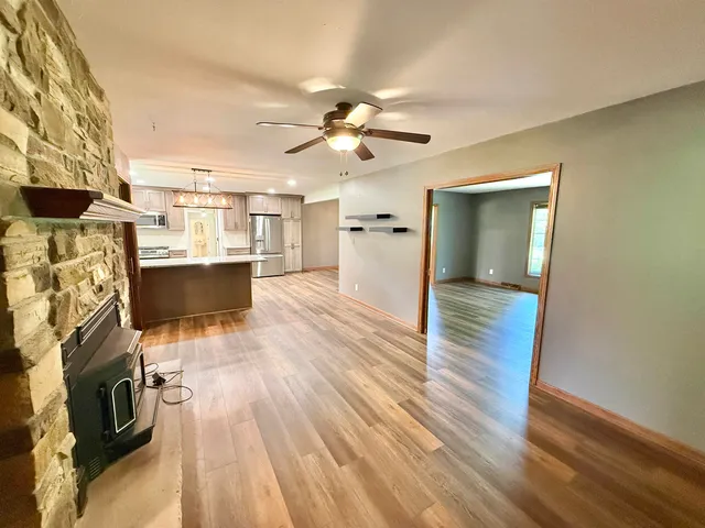 a view of a livingroom with wooden floor