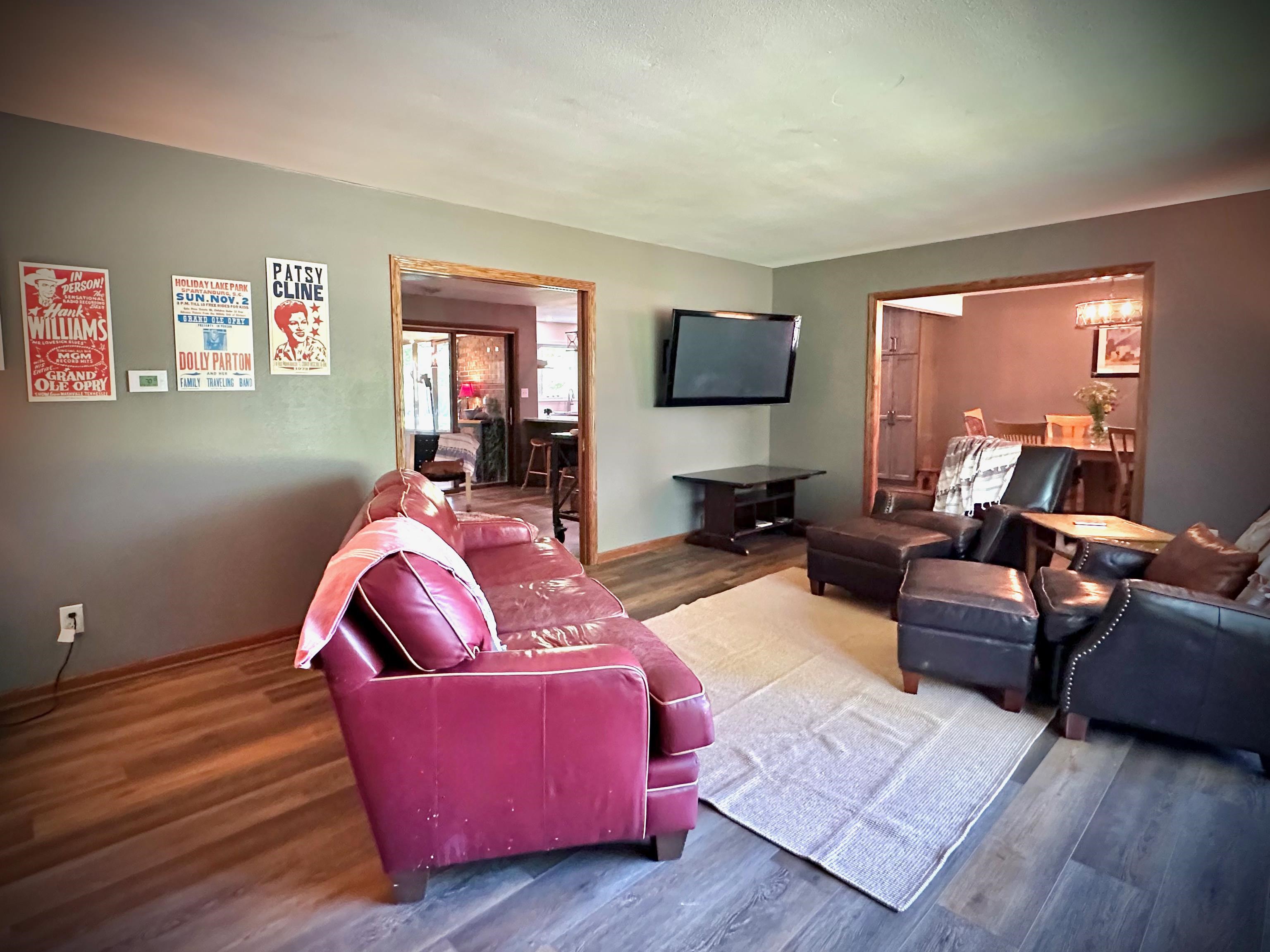 7356 Kishwaukee Road Rockford, IL 61109 - Photo 13 of 71 a living room with furniture and a flat screen tv