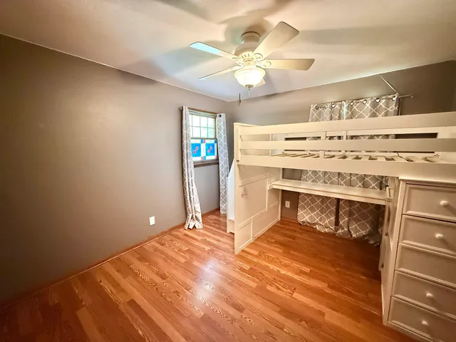 a view of a kitchen with a sink cabinets and window