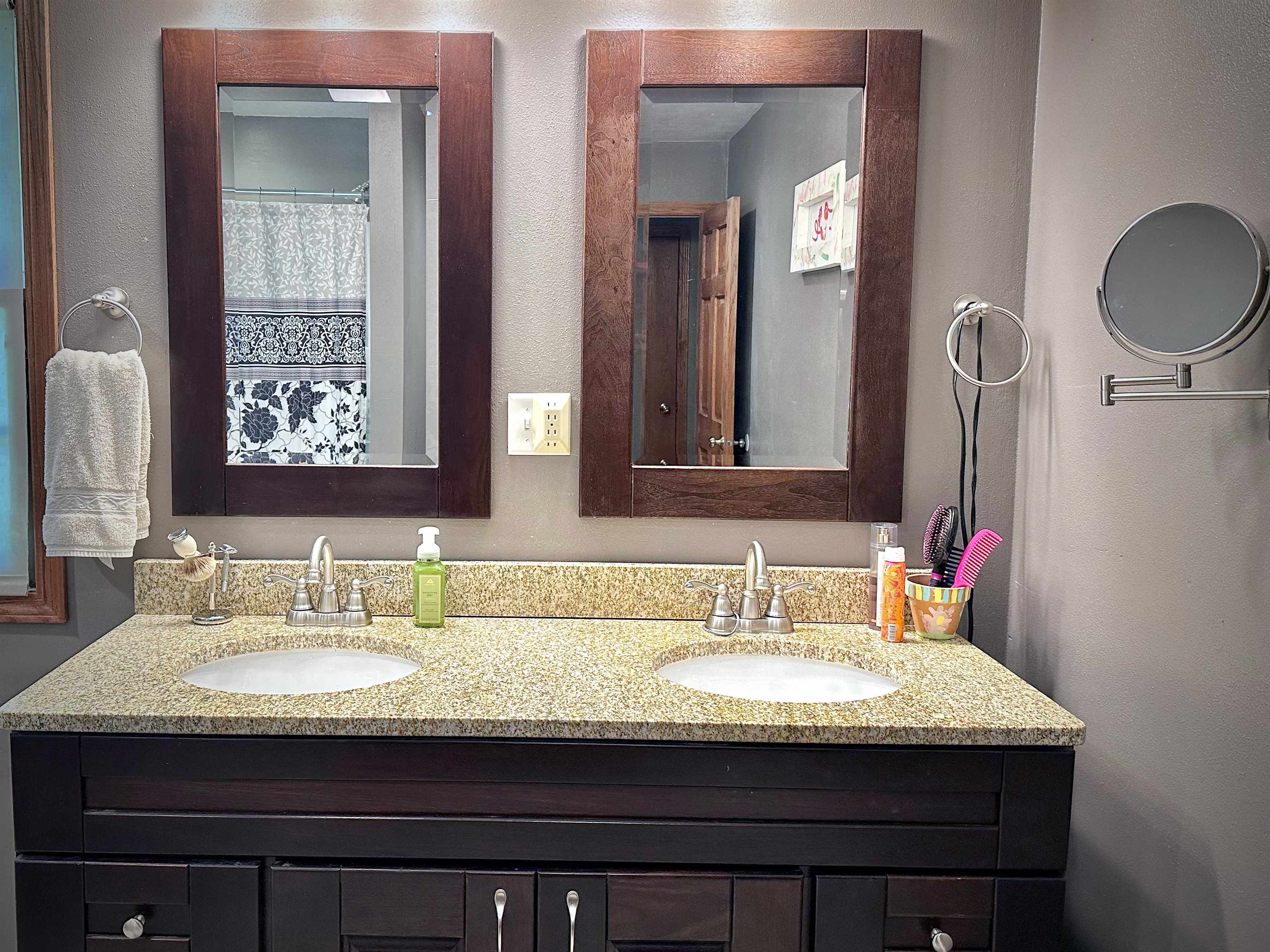 7356 Kishwaukee Road Rockford, IL 61109 - Photo 25 of 71 a bathroom with granite countertop double vanity sinks and a mirror