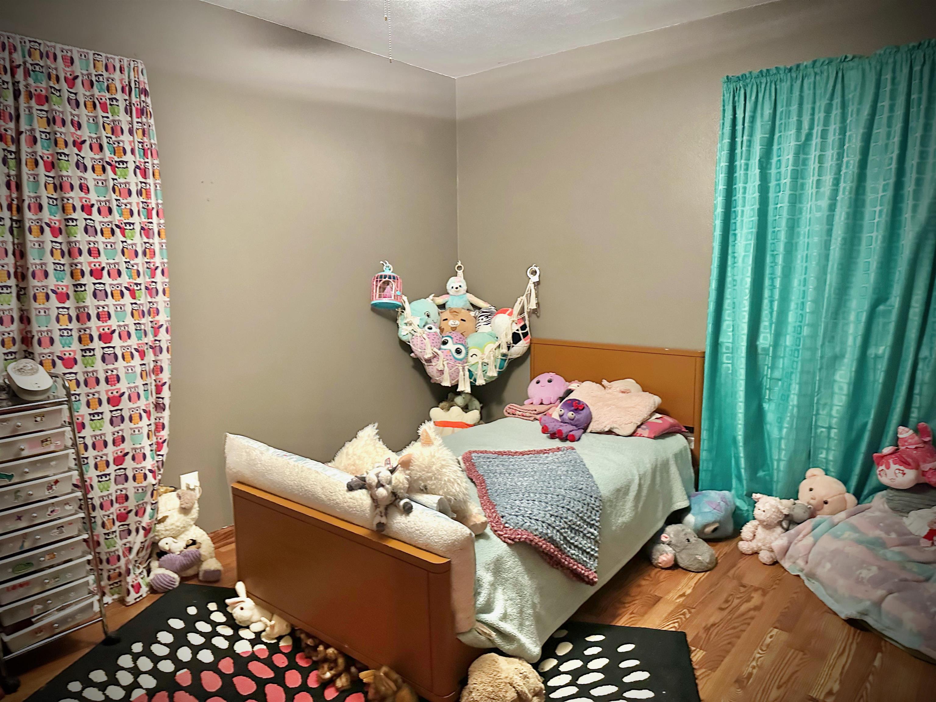 7356 Kishwaukee Road Rockford, IL 61109 - Photo 27 of 71 a bed room with a bed and a table