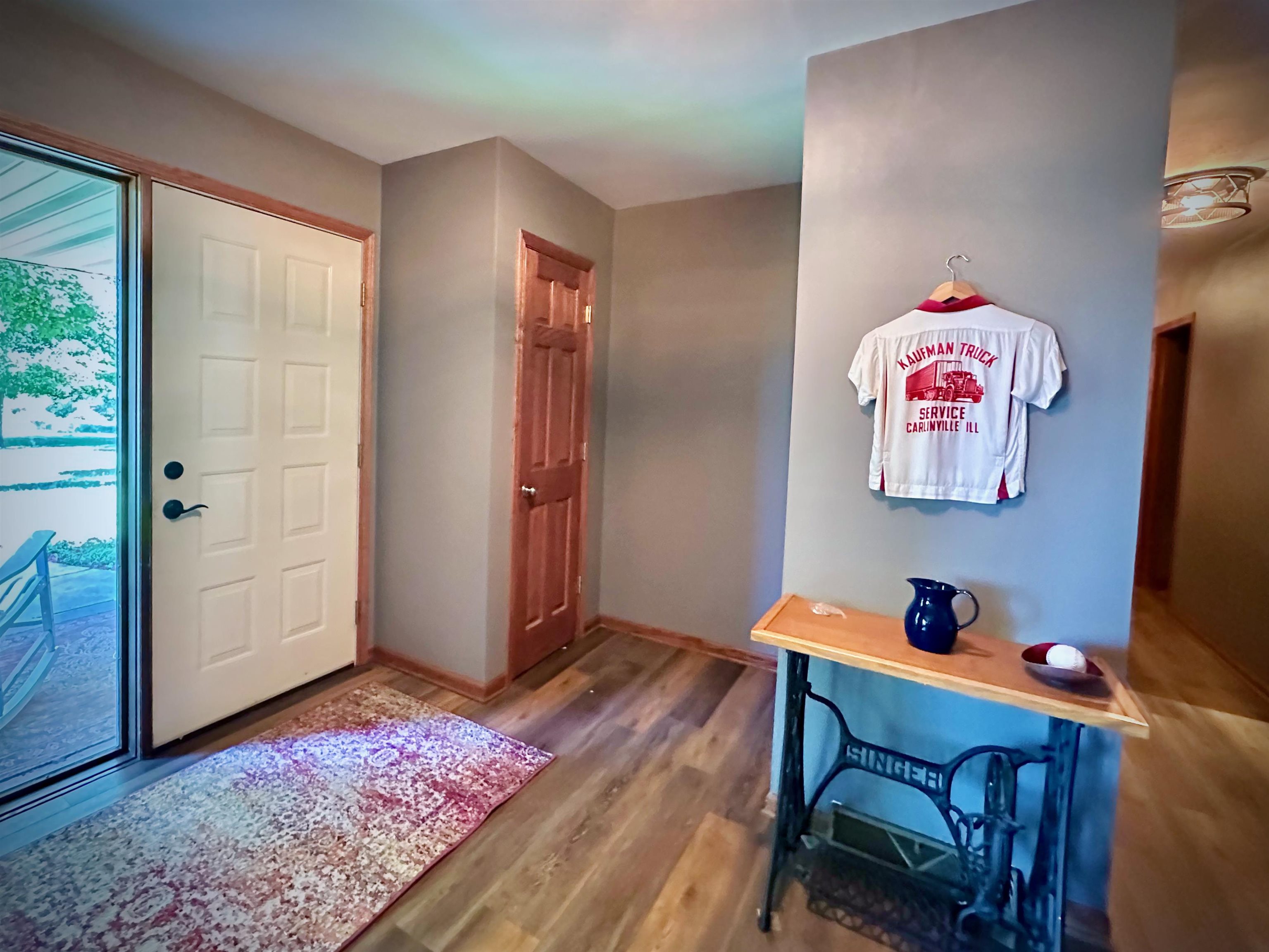 7356 Kishwaukee Road Rockford, IL 61109 - Photo 3 of 71 a workspace with furniture and window