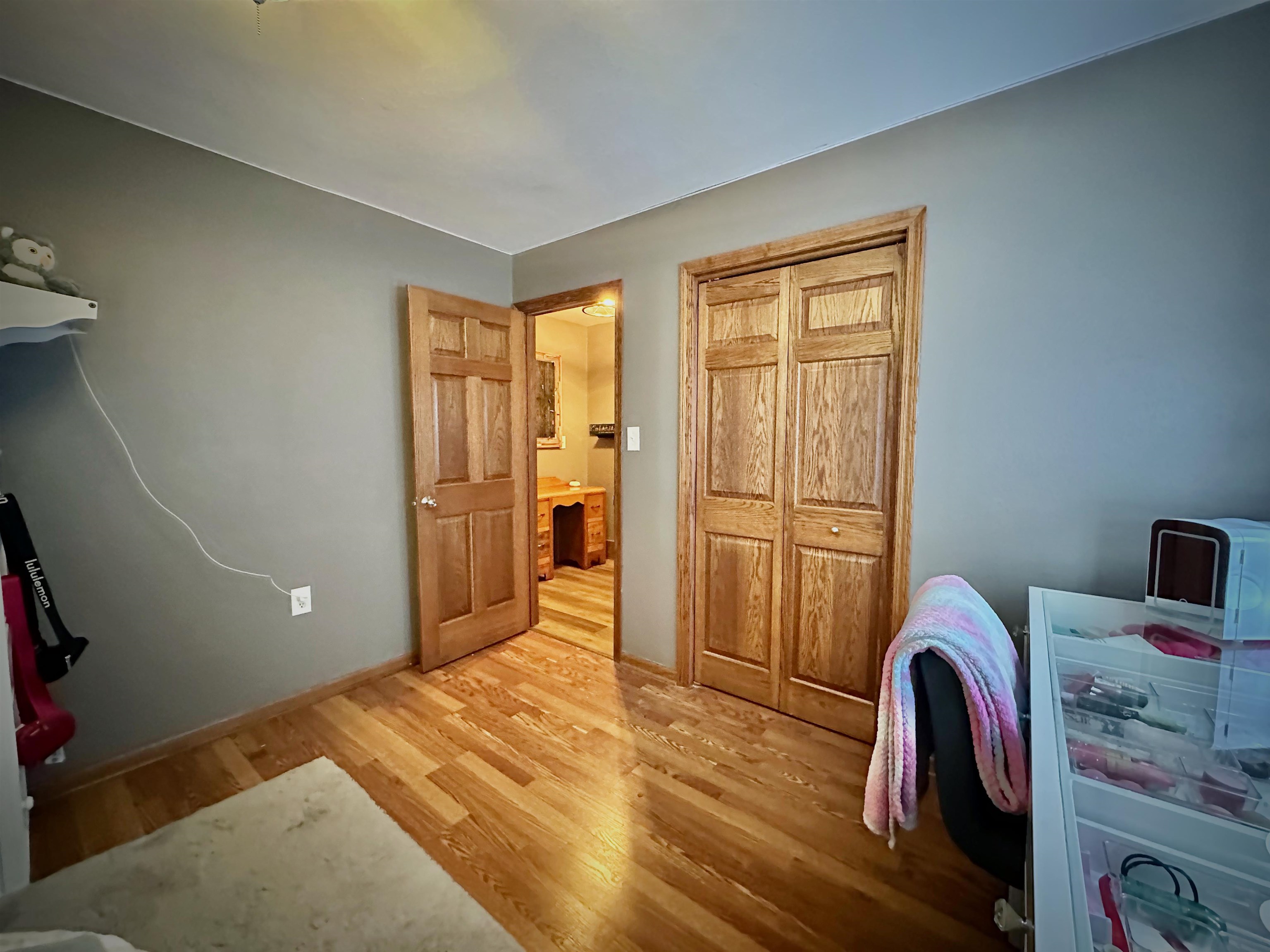 7356 Kishwaukee Road Rockford, IL 61109 - Photo 32 of 71 a view of a livingroom with wooden floor and furniture