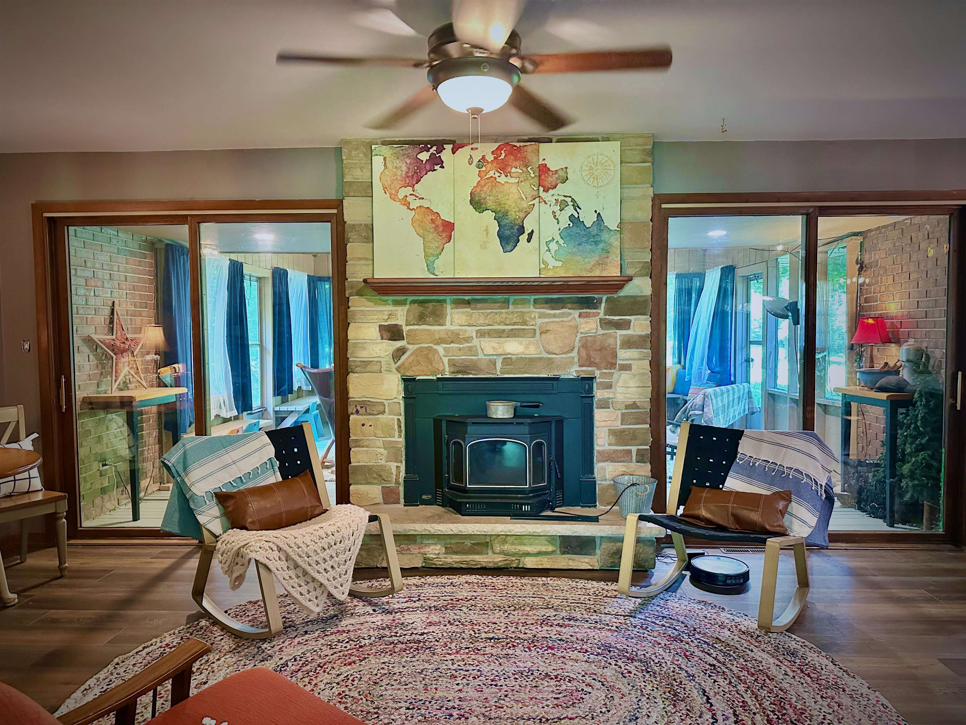 7356 Kishwaukee Road Rockford, IL 61109 - Photo 54 of 71 a living room with furniture and a fireplace