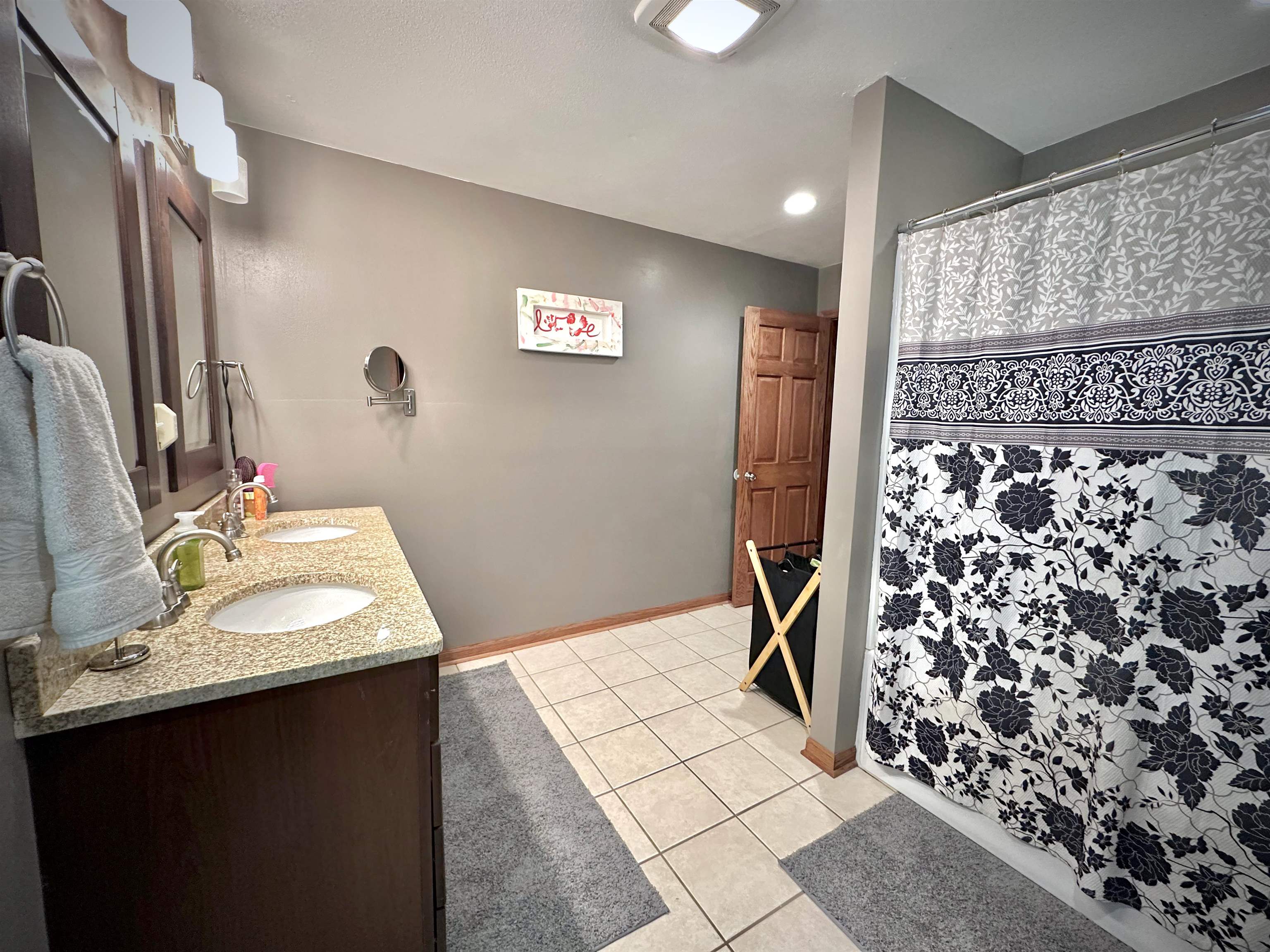 7356 Kishwaukee Road Rockford, IL 61109 - Photo 65 of 71 a bathroom with a sink toilet and shower