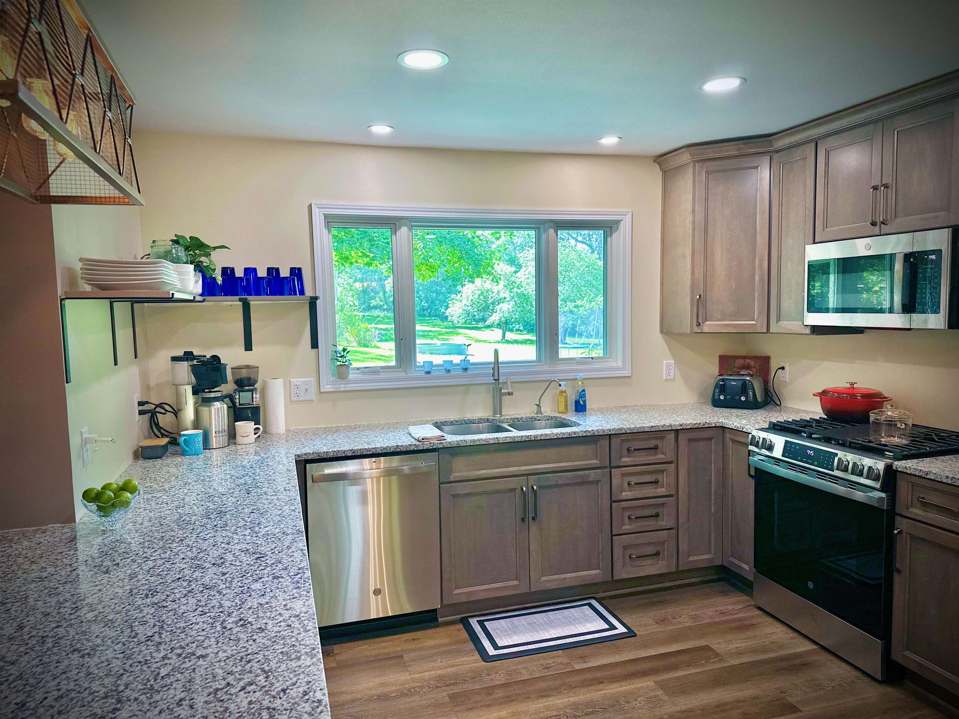 7356 Kishwaukee Road Rockford, IL 61109 - Photo 9 of 71 a kitchen with a sink cabinets and window