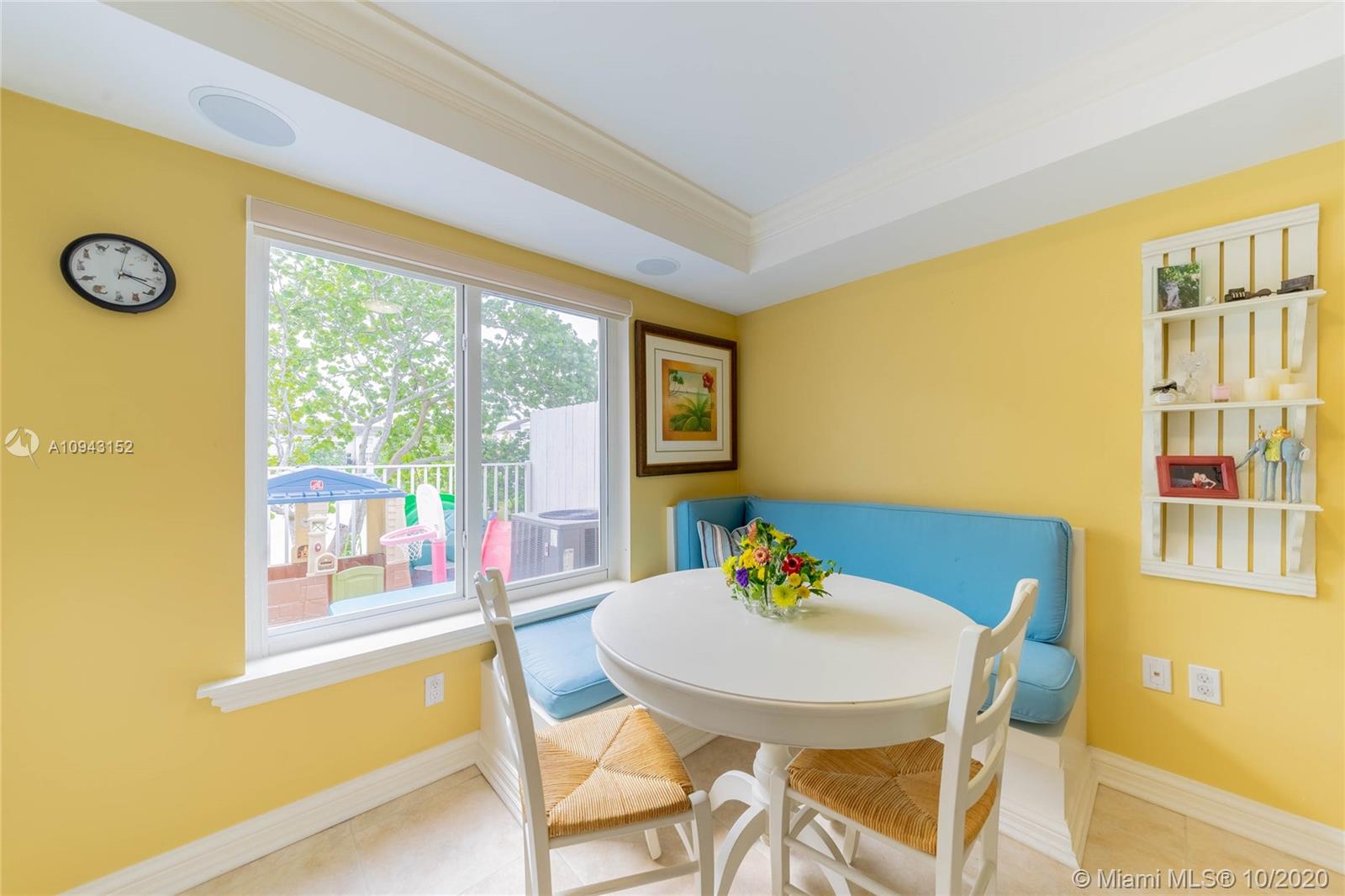 5580 Southwest 70th Place South Miami, FL 33155 - Photo 4 of 13 a view of a dining room with furniture window and outside view