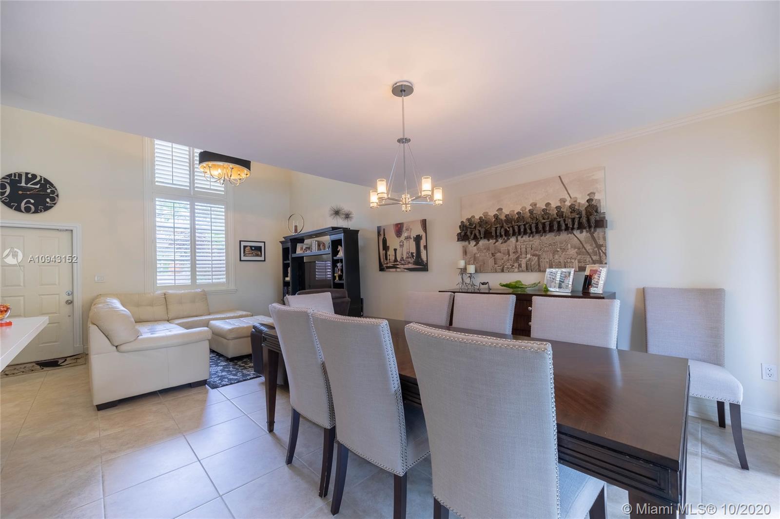 5580 Southwest 70th Place South Miami, FL 33155 - Photo 5 of 13 a view of a dining room with furniture