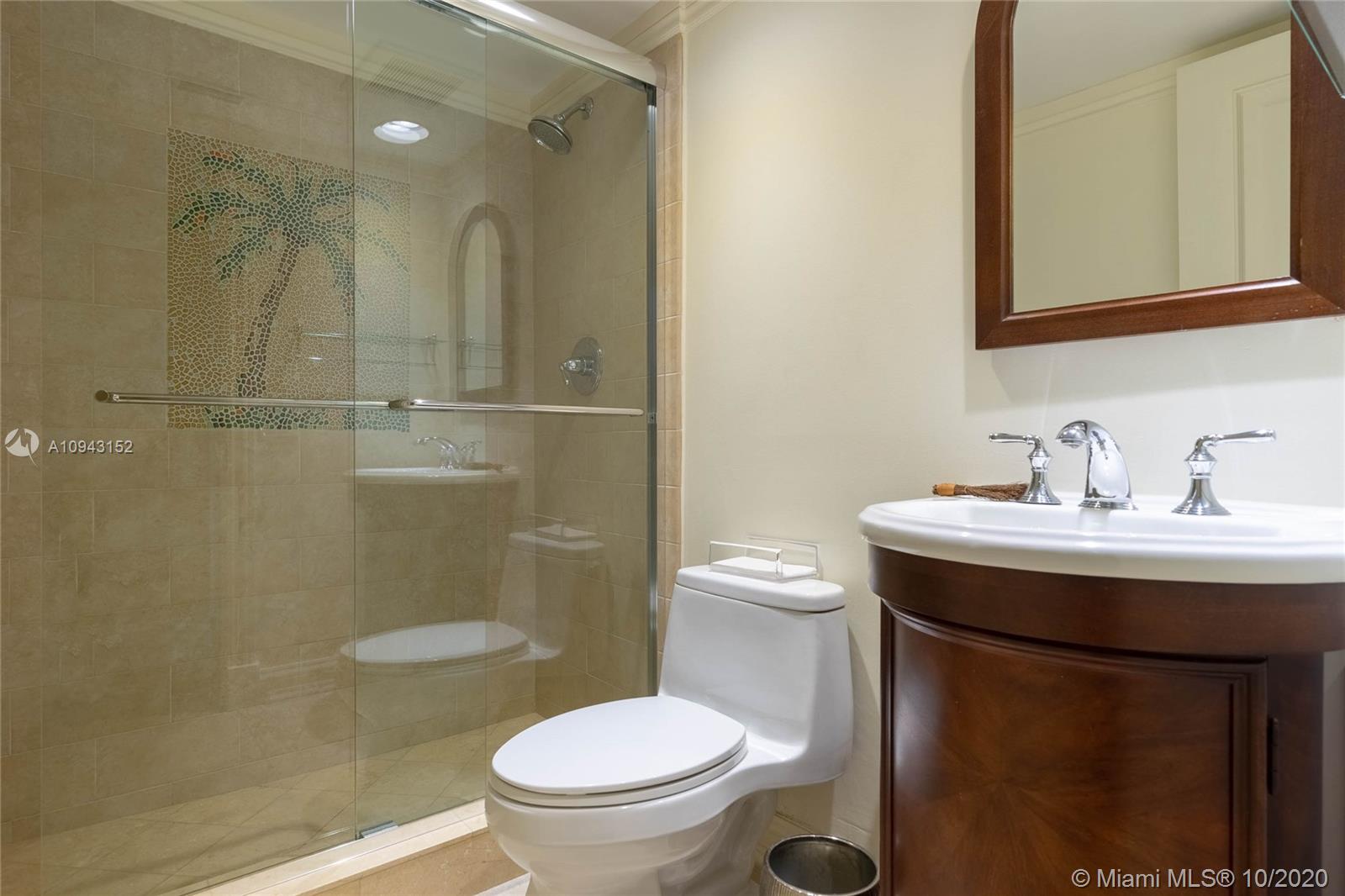 5580 Southwest 70th Place South Miami, FL 33155 - Photo 10 of 13 a bathroom with a sink toilet and shower