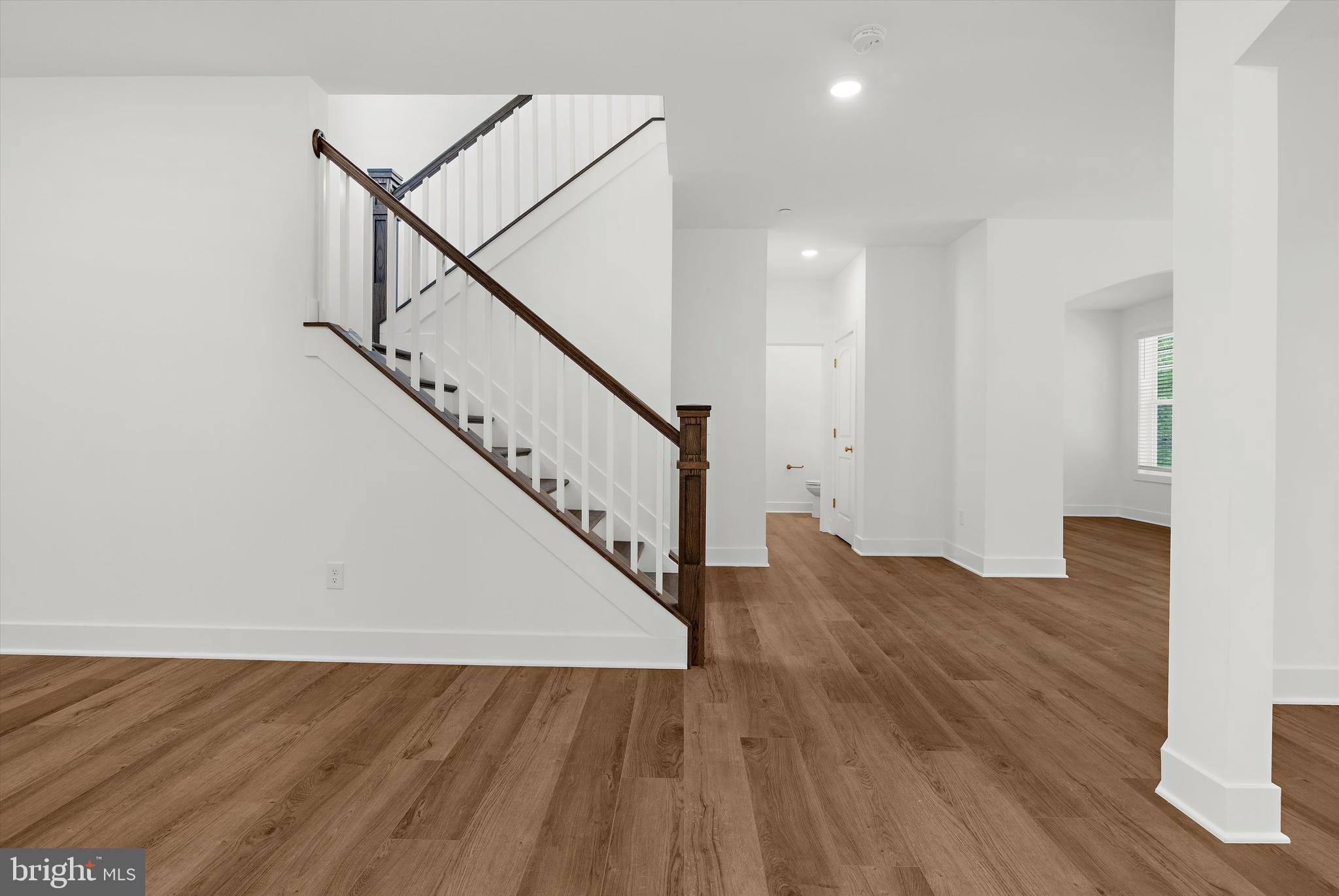 1807 Mountain Bay Road Pasadena, MD 21122 - Photo 11 of 75 a view of entryway and hall with wooden floor