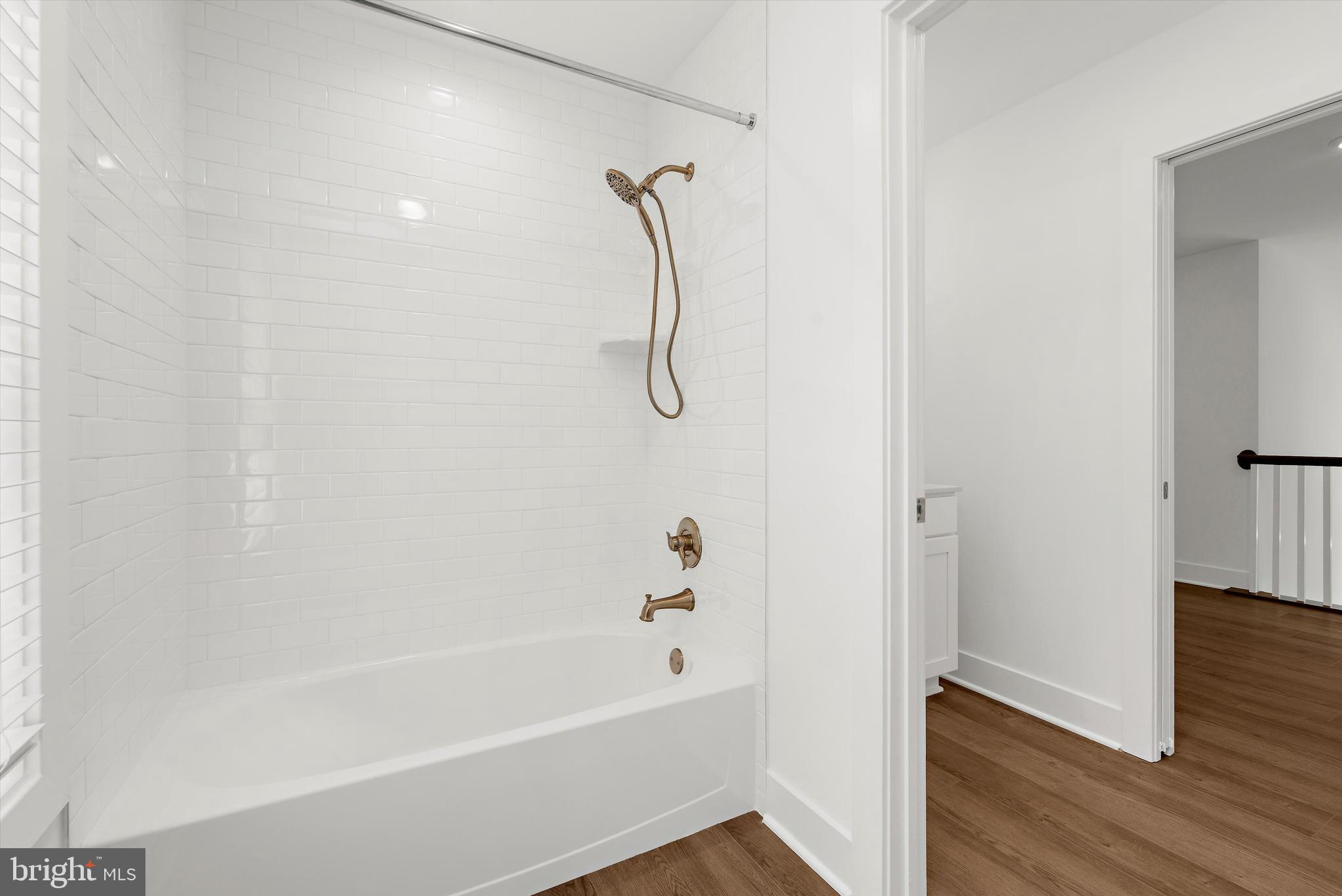 1807 Mountain Bay Road Pasadena, MD 21122 - Photo 41 of 75 a bathroom with a bath tub with a shower