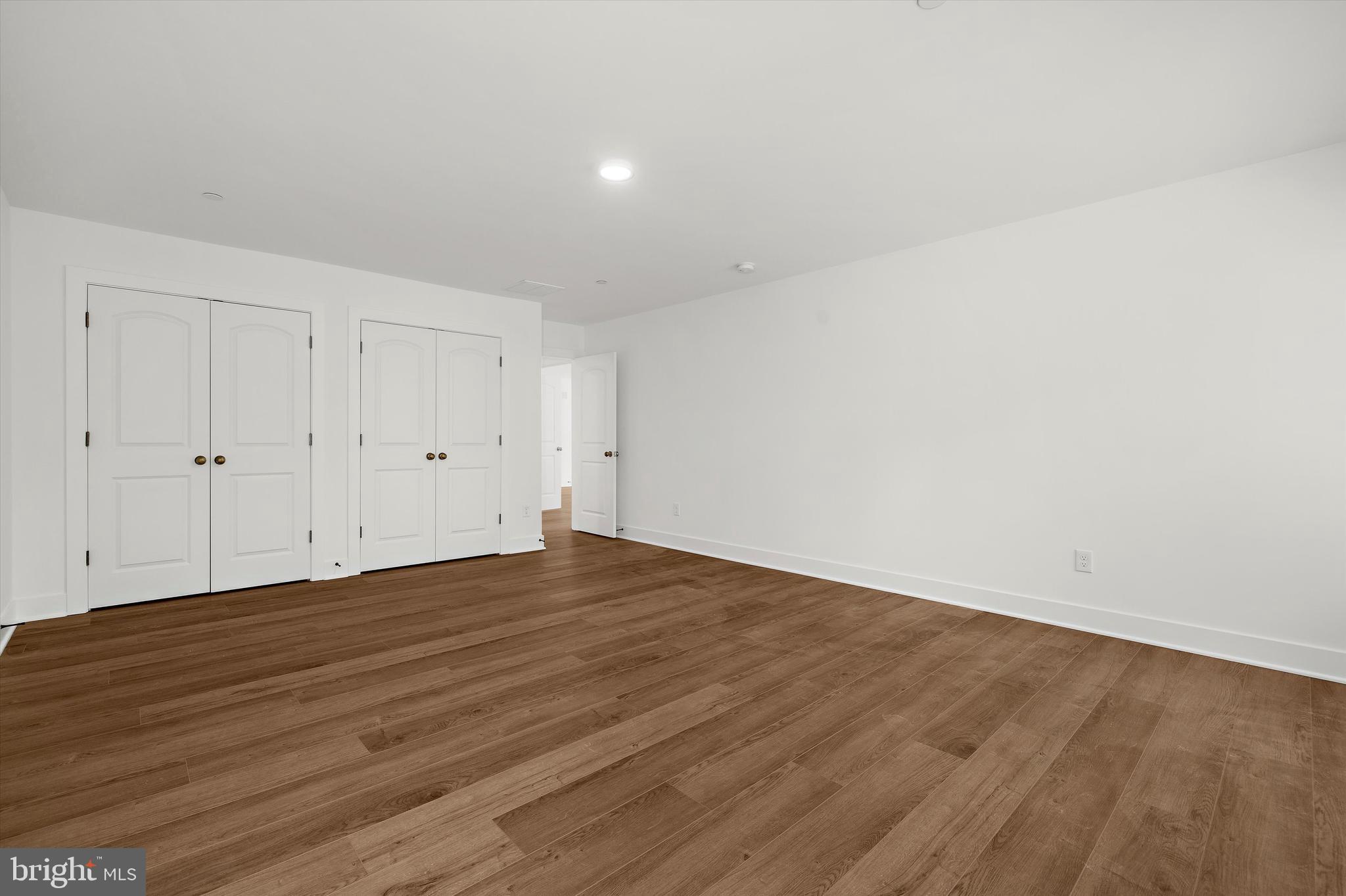 1807 Mountain Bay Road Pasadena, MD 21122 - Photo 45 of 75 a view of an empty room with wooden floor