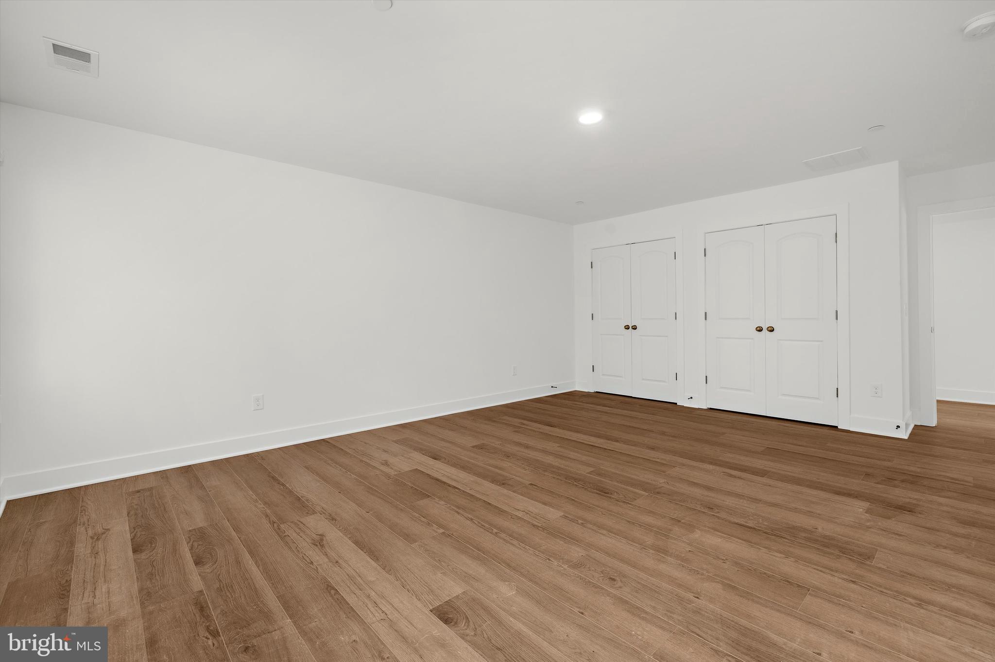 1807 Mountain Bay Road Pasadena, MD 21122 - Photo 46 of 75 a view of empty room with wooden floor
