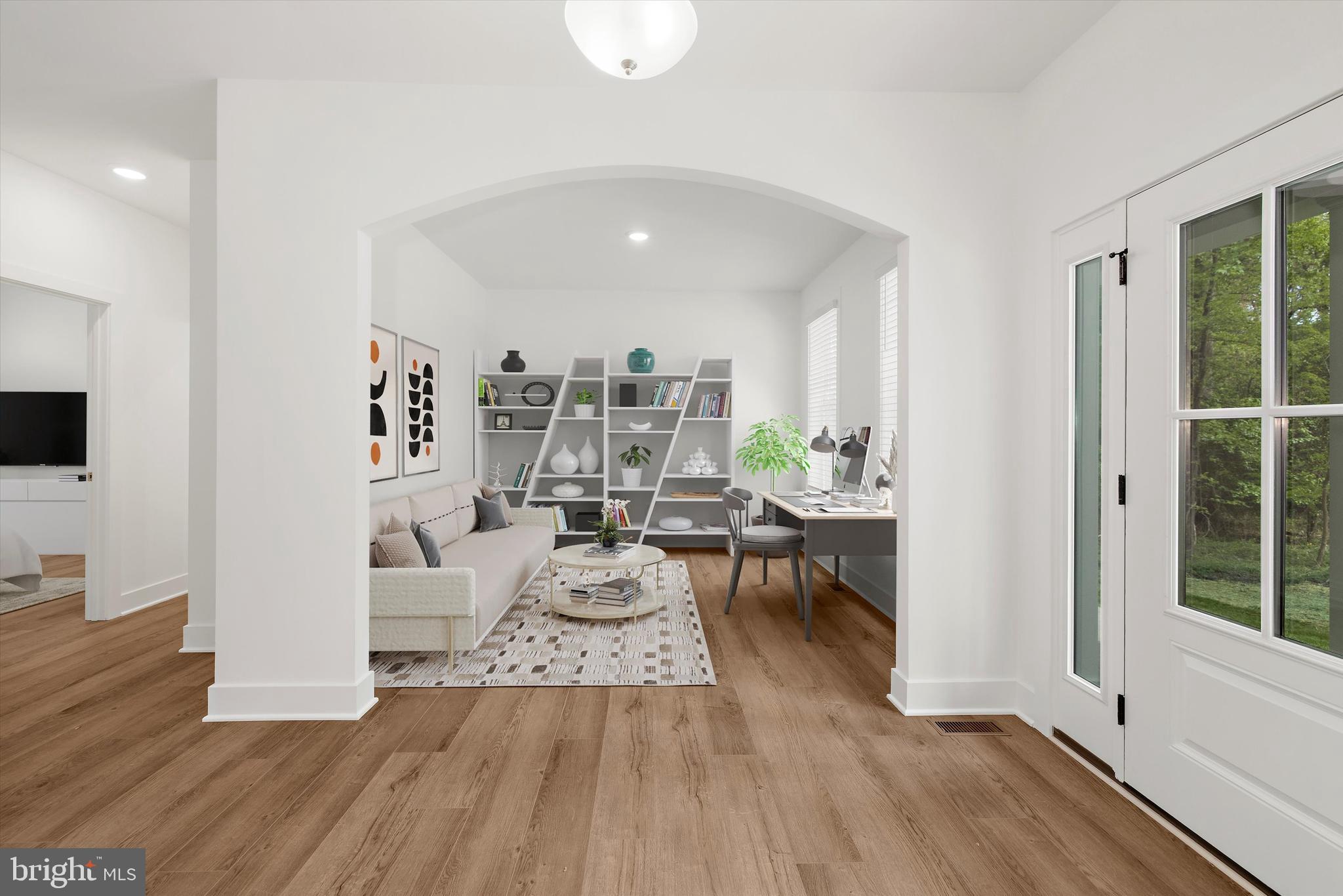 1807 Mountain Bay Road Pasadena, MD 21122 - Photo 67 of 75 a living room with furniture and a wooden floor