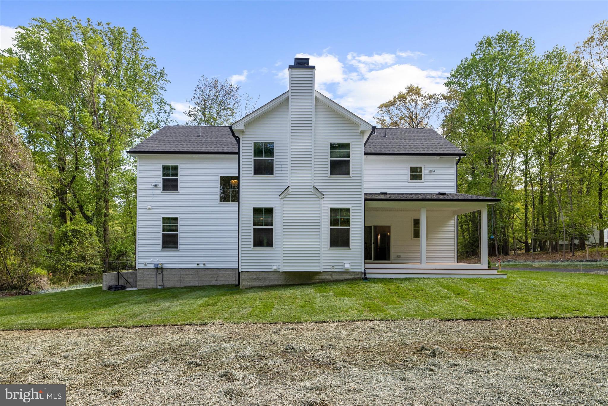 1807 Mountain Bay Road Pasadena, MD 21122 - Photo 9 of 75 a front view of house with yard and green space