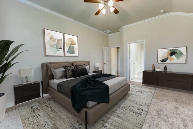 a spacious bedroom with a bed and a couch