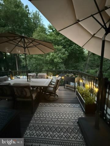 632 Concerto Lane Silver Spring, MD 20901 - Photo 3 of 5 Serene deck retreat amidst nature.