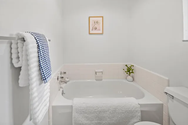 a bathroom with a white tub