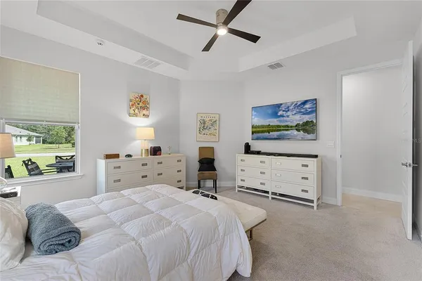 a bedroom with a bed and furniture