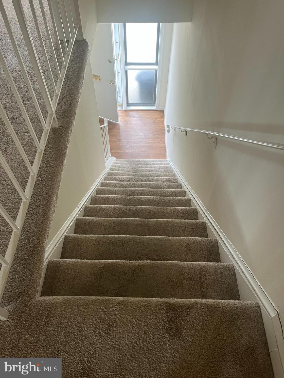 3182 Adderley Court, Unit 240E Silver Spring, MD 20906 - Photo 17 of 25 Stairs leading to the upper level.