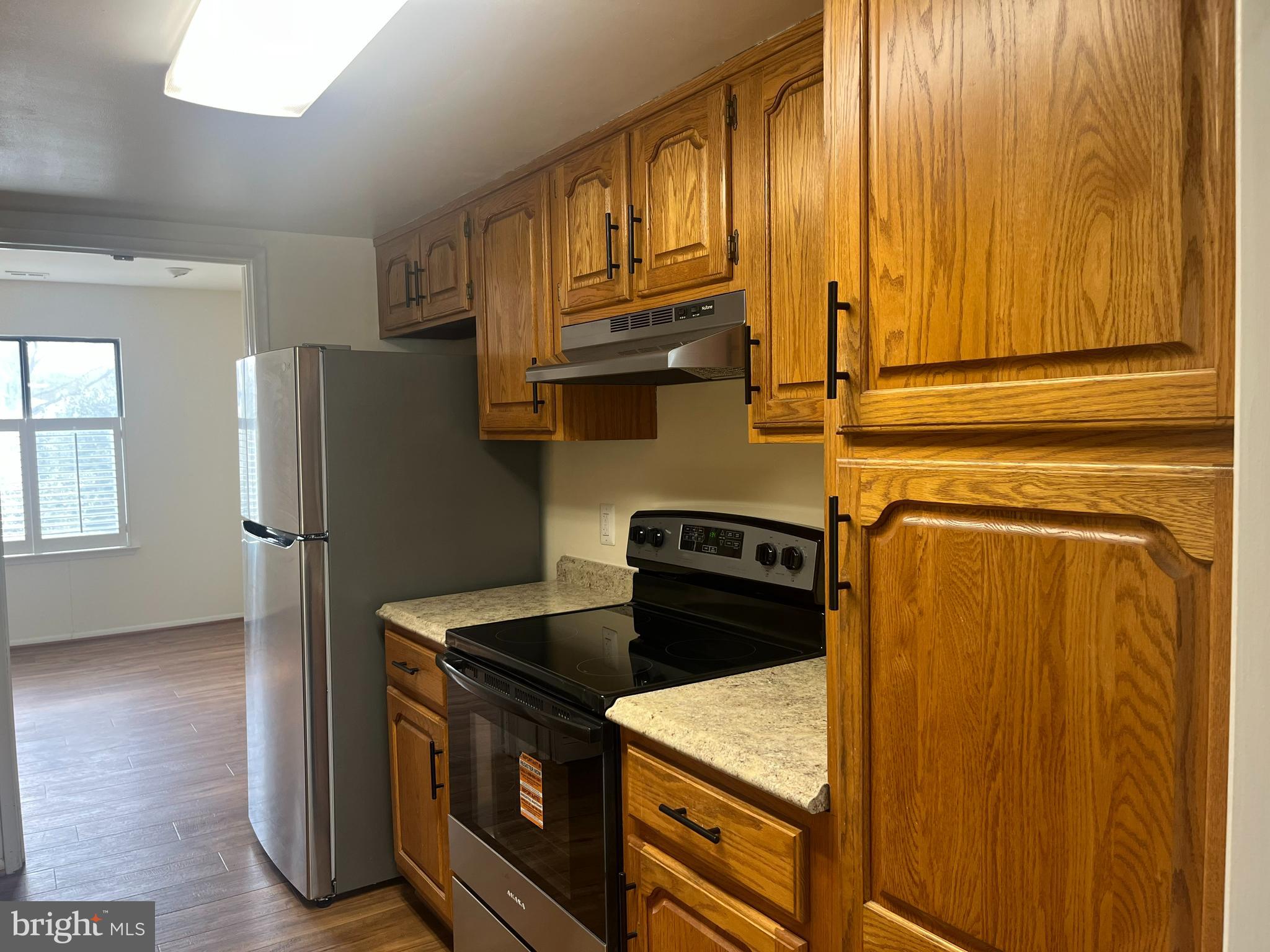 3182 Adderley Court, Unit 240E Silver Spring, MD 20906 - Photo 5 of 25 Kitchen with brand new appliances.