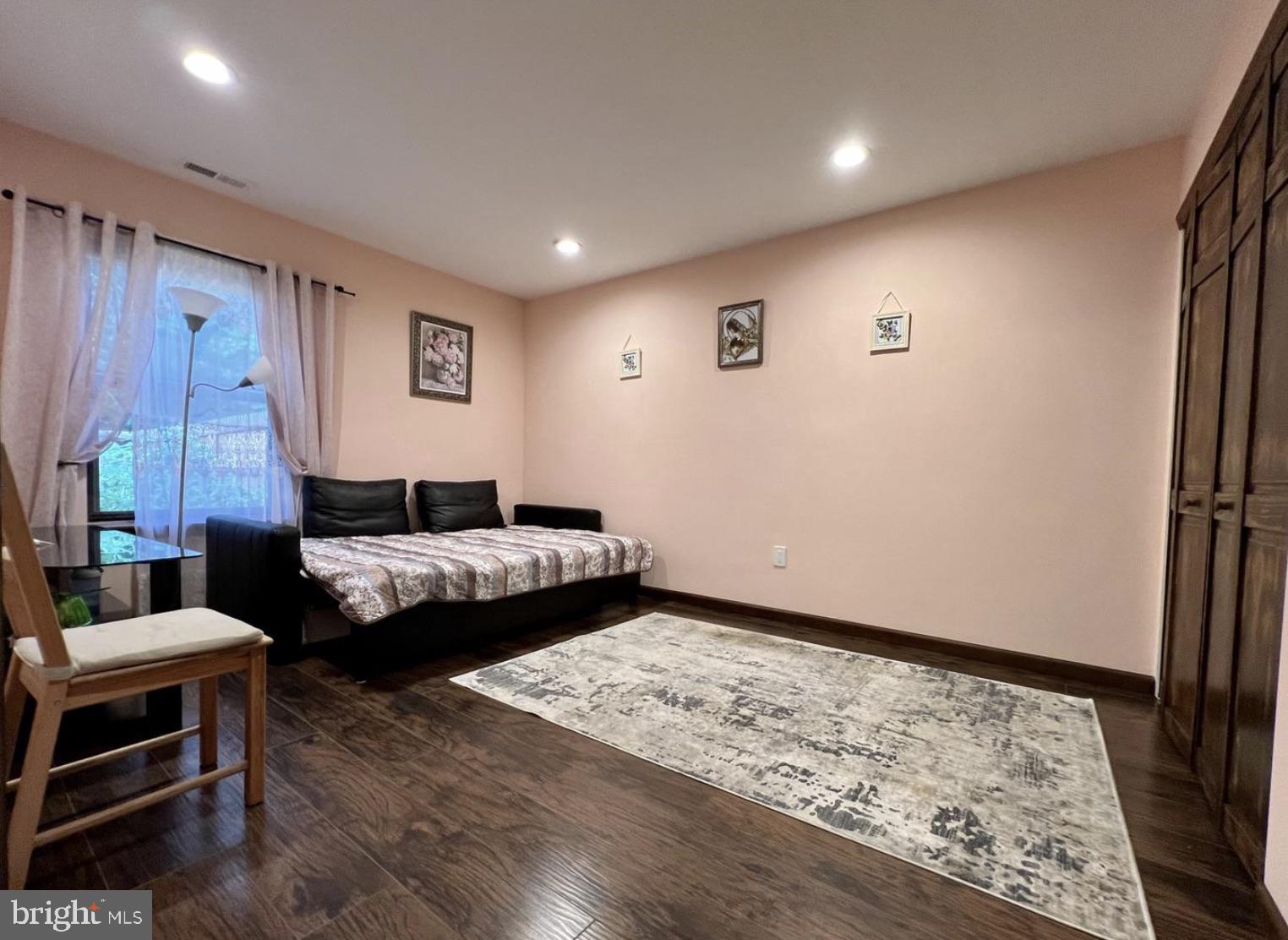52 Sandpiper Drive Voorhees, NJ 08043 - Photo 14 of 26 a bedroom with furniture and a wooden floor