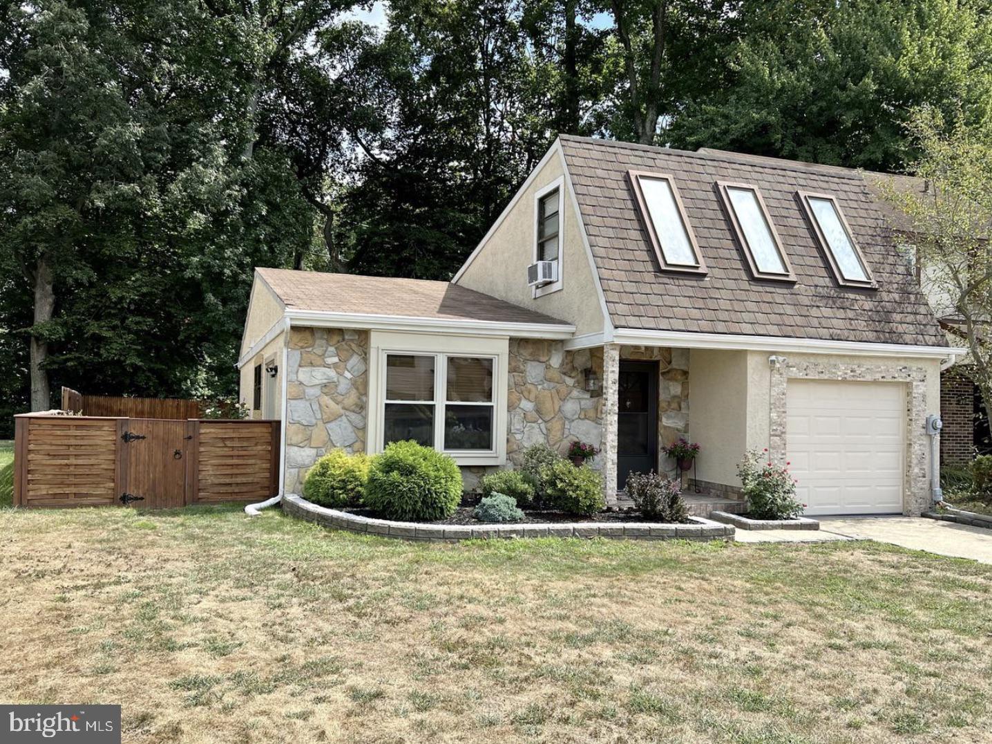 52 Sandpiper Drive Voorhees, NJ 08043 - Photo 2 of 26 a view of a house with a yard and plants
