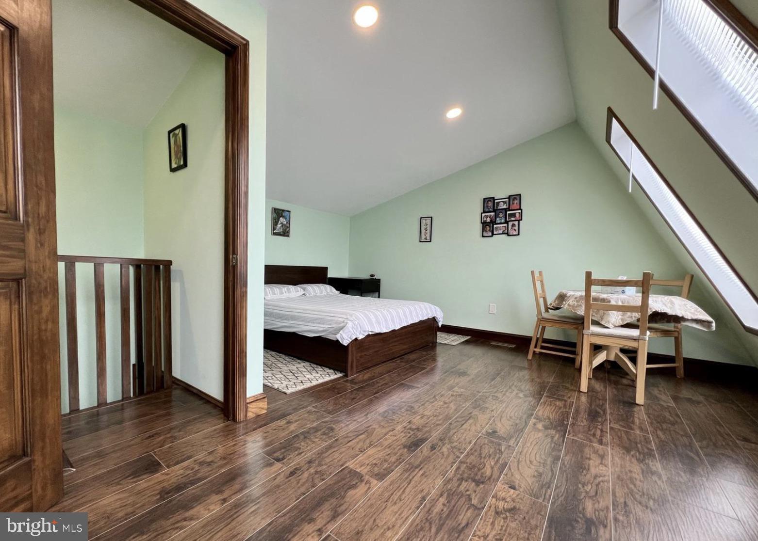 52 Sandpiper Drive Voorhees, NJ 08043 - Photo 21 of 26 a bedroom with a bed and a wooden floor