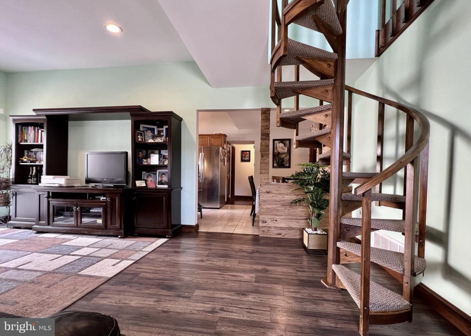 52 Sandpiper Drive Voorhees, NJ 08043 - Photo 5 of 26 a living room with fireplace furniture and a flat screen tv
