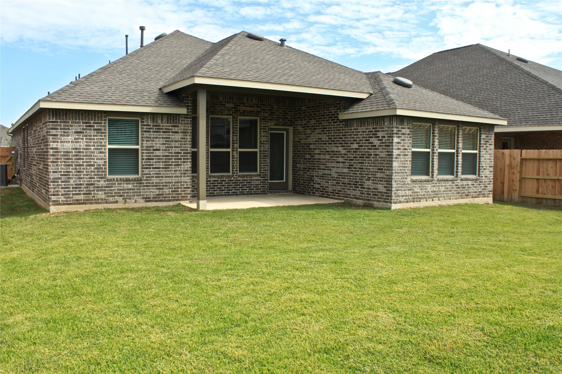 4408 Mimic Drive Spring, TX 77386 - Photo 17 of 27 a front view of a house with garden