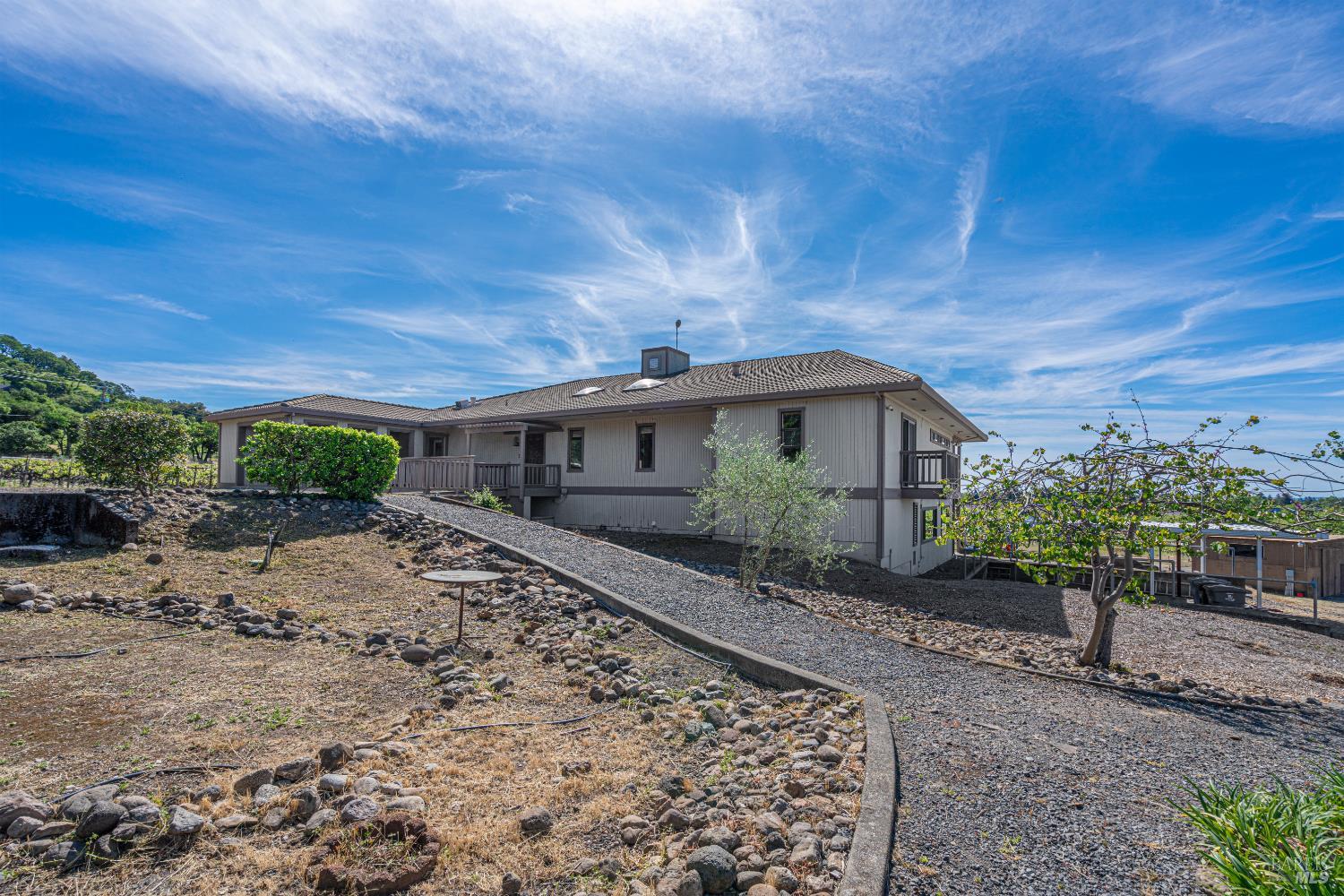 590 Pleasant Avenue Santa Rosa, CA 95403 - Photo 55 of 84 a front view of a house with a garden