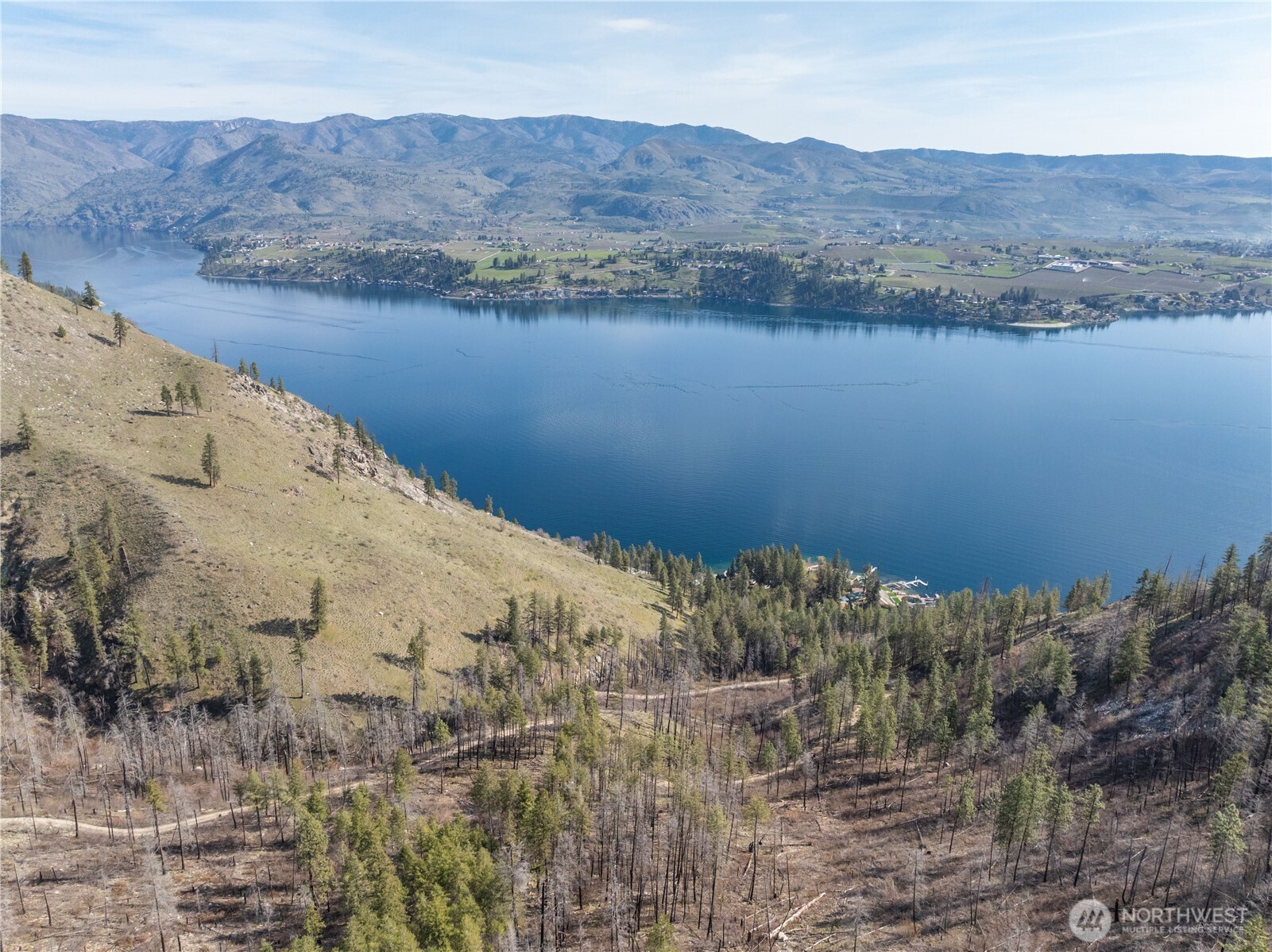 109 Granite Falls Road Chelan, WA 98816 - Photo 6 of 22 a view of a lake and mountains